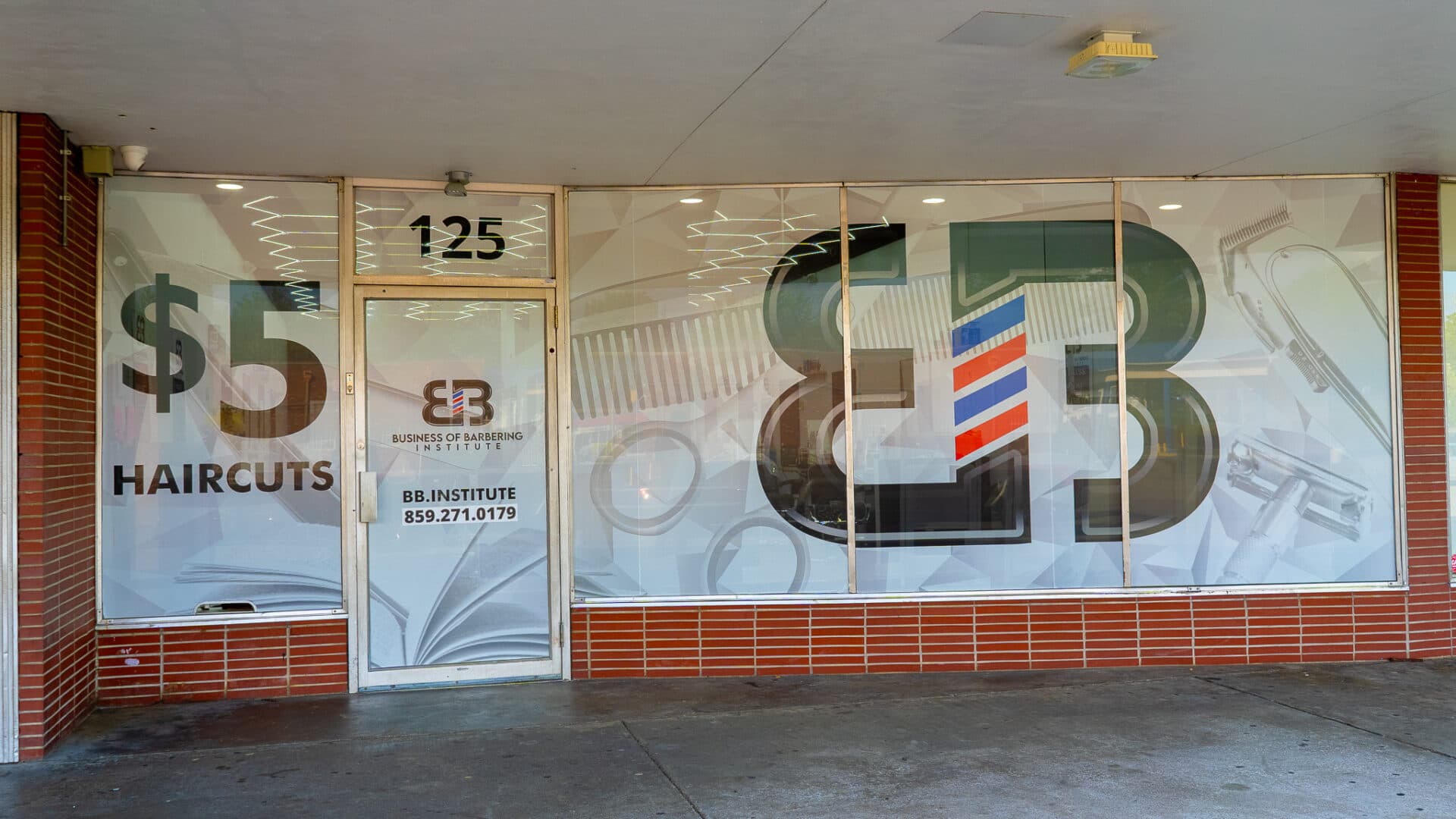 Students training on the BBI barbering floor